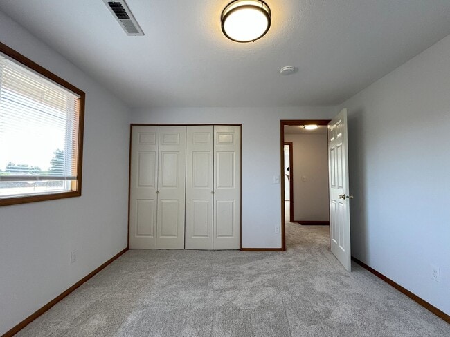 Building Photo - Spacious 4-Bedroom, 2.5-Bathroom Home with...