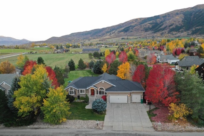 Building Photo - Beautiful home with 3 car garage and oversized covered deck.