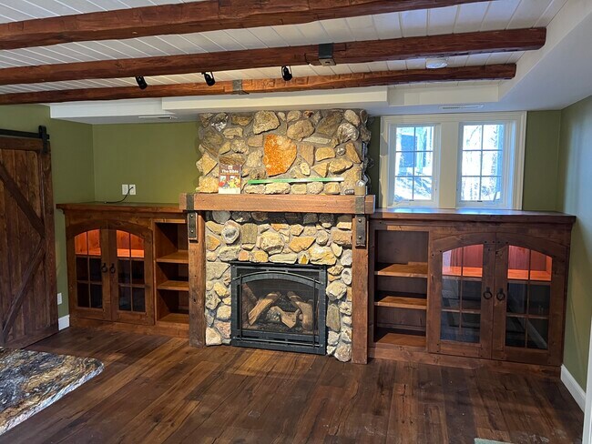 Cozy fireplace off kitchen. - 27 S Riverview Hts