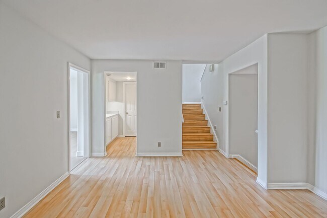 Building Photo - PRIME POOLFRONT LOCATION & CLOSE TO MAIN GATE! BRIGHT & SPACIOUS, END-UNIT POOLFRONT TOWNHOUSE W/...