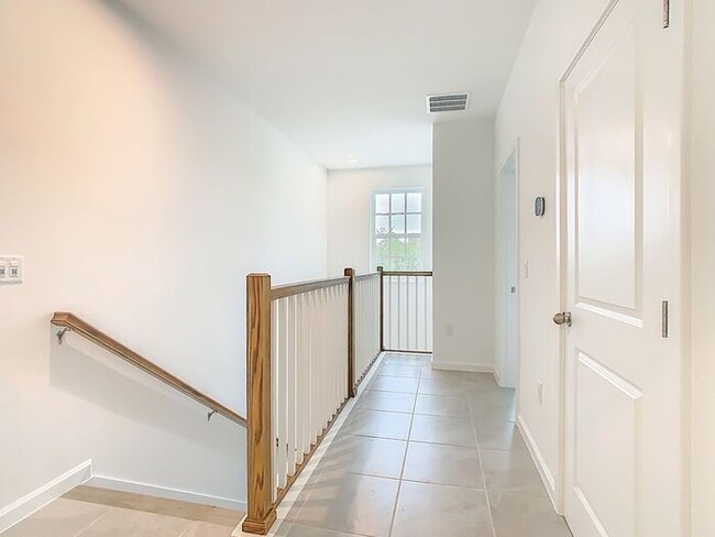 Building Photo - New Luxury Townhome in Celebration with All porcelain tiled floors. Island Village new construction