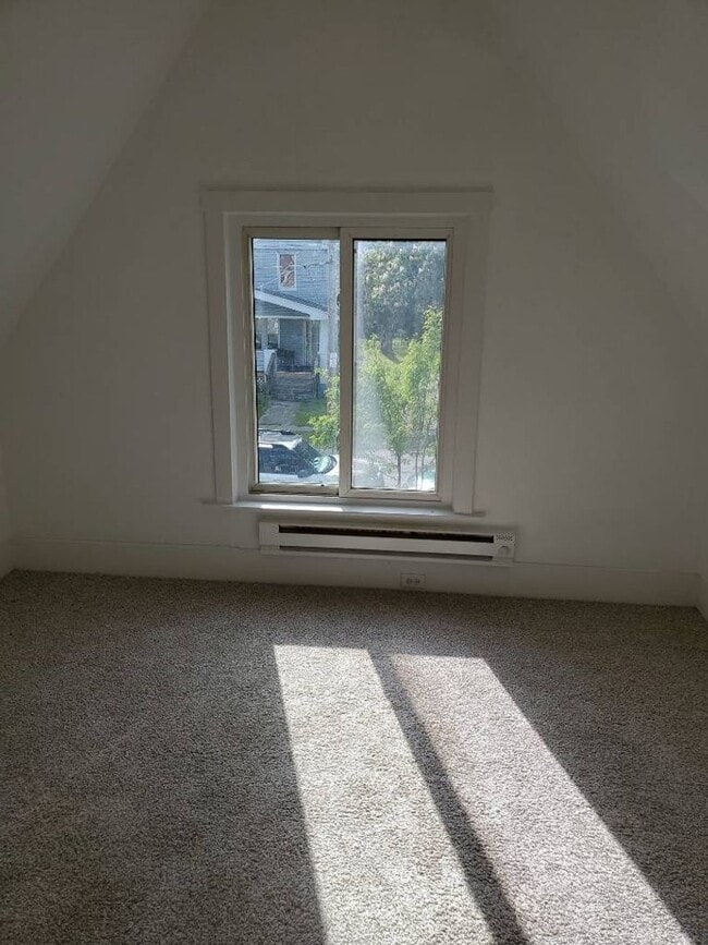 Building Photo - Newly Renovated 4BR/1BA Single-Family Home with Garage – Cleveland