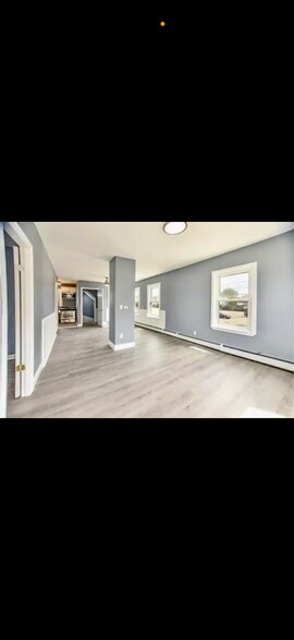 Dining and living room exit to first floor exit - 415 Weeden St