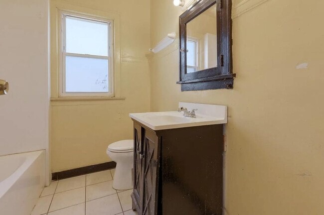 Building Photo - 1301 W 71st Pl