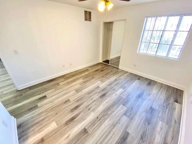 Building Photo - CONDOMINIUM IN A GATED COMMUNITY WITH 2 BE...