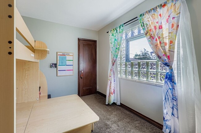 Building Photo - LOCATION LOCATION!! Unique Tudor 2-bed 1-bath upstairs unit in beautiful Tudor Duplex- All Utilit...