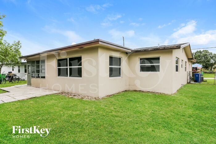 Building Photo - 6891 NW 25th Ct