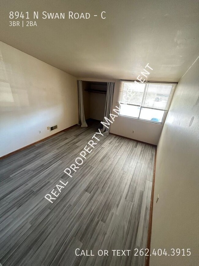 Building Photo - 8941 N Swan Rd