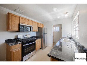 Building Photo - Welcome to this Charming 2/1 Phoenix Duplex Unit!