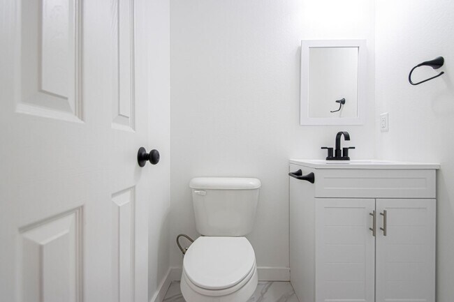 Building Photo - Large Open-Concept 4 Bedroom with Stunning Pond Views!