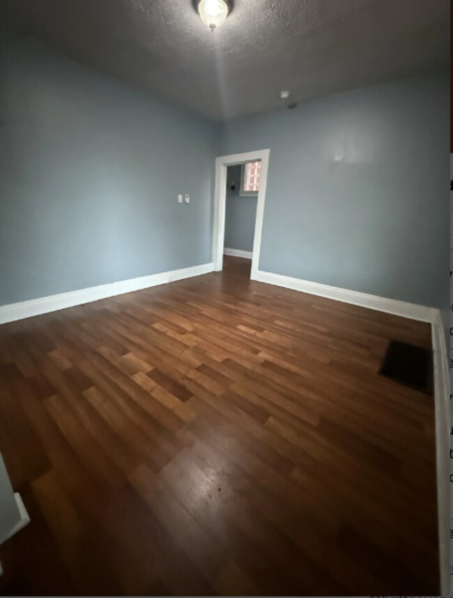 Building Photo - 7656 Highland Ave
