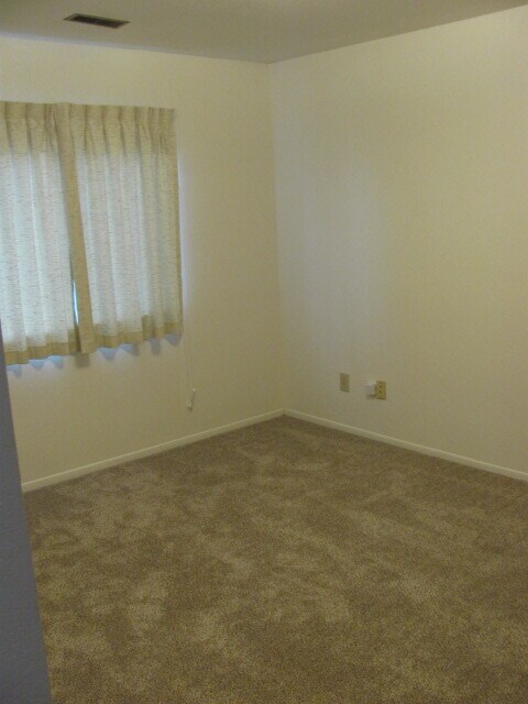 New window coverings and carpets in master bedroom - 5520 Bowden Loop