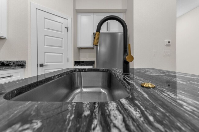 Building Photo - All Units Are Available With Brandnew Full Appliance Package