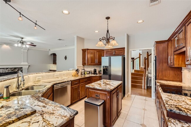Building Photo - Stunning Home in Guard Gated Community ~ I...