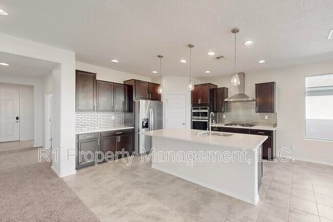 Building Photo - 6405 Kings Cyn Cv NE