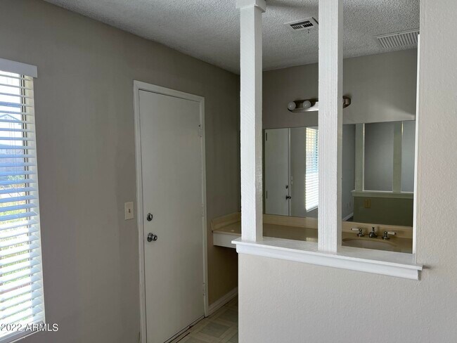 Building Photo - 7827 W College Dr