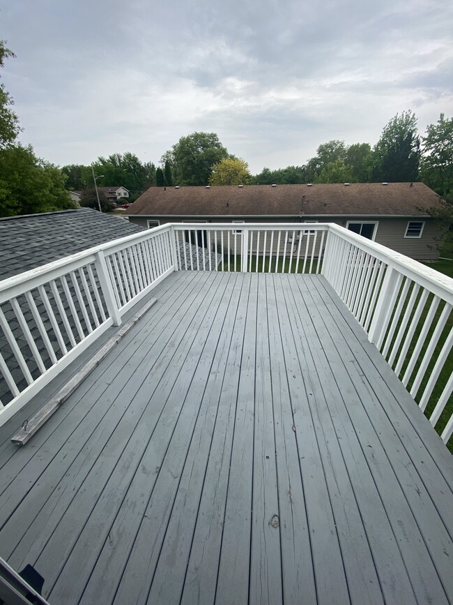 Patio, off of kitchen, looks over side and back yards - 2912 12th St S