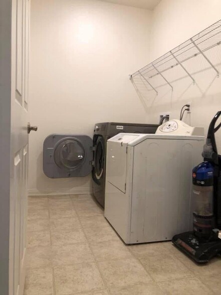 laundry room (shared with the other duplex unit and a studio unit) - 7893 Boot Straps Ct
