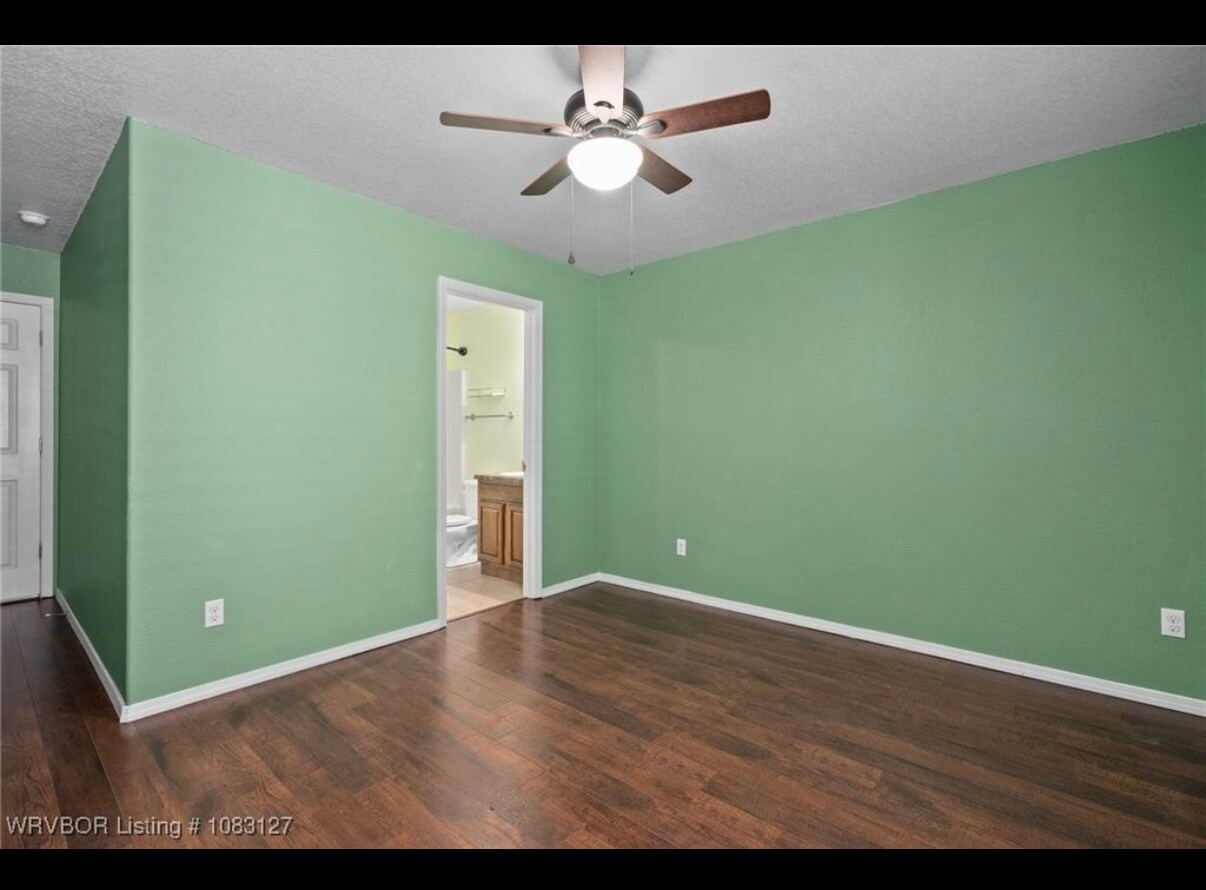 Main bedroom with view of bathroom and walk in closet - 2410 Ridgeway Ln