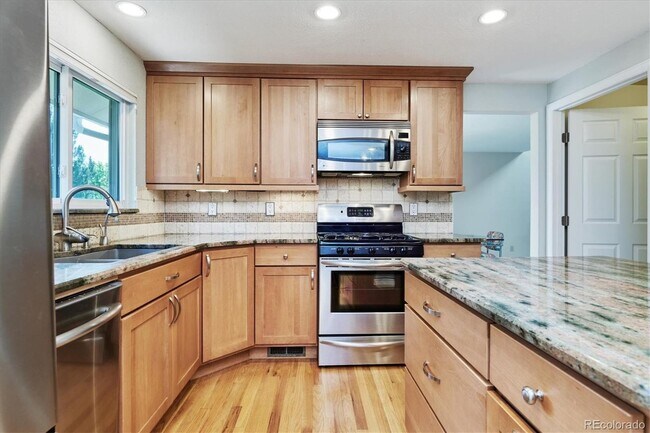Building Photo - 10725 E Maplewood Dr