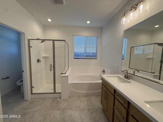 Building Photo - 9960 W Mitchell Ave