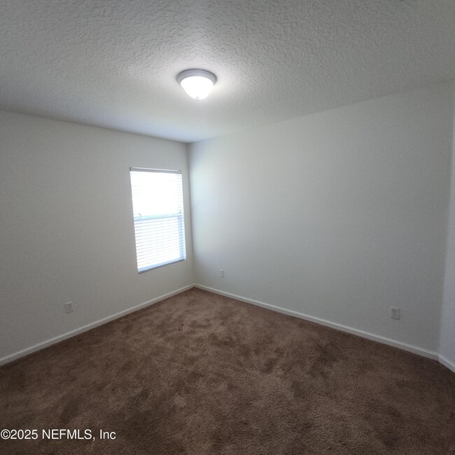 Building Photo - 15307 Bareback Dr