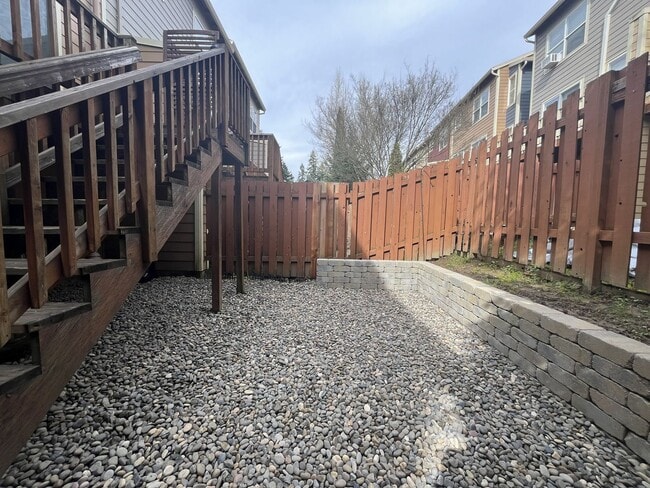 Building Photo - Beautiful 2 Bedroom Townhome with Walk-In Closets Private Deck & Attached Garage