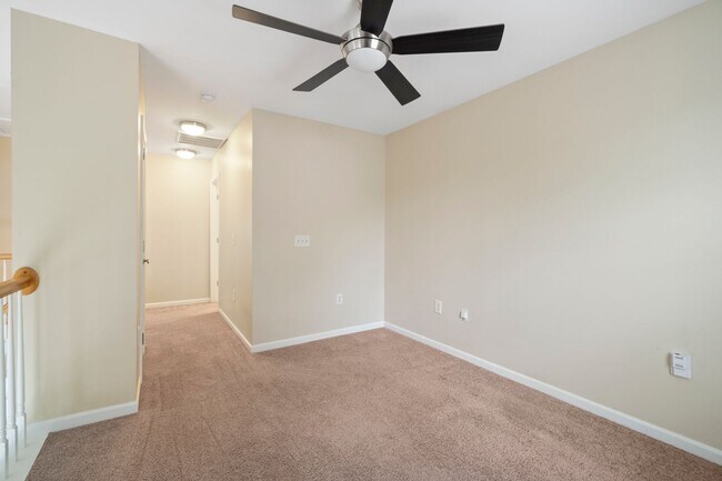 Building Photo - Located in Highland Creek