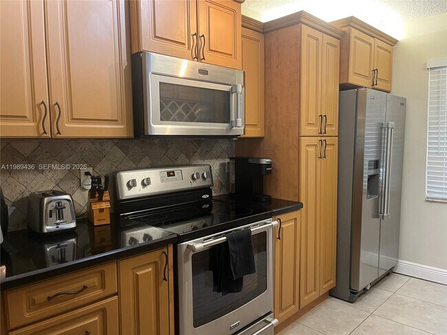 Building Photo - 10401 W Broward Blvd