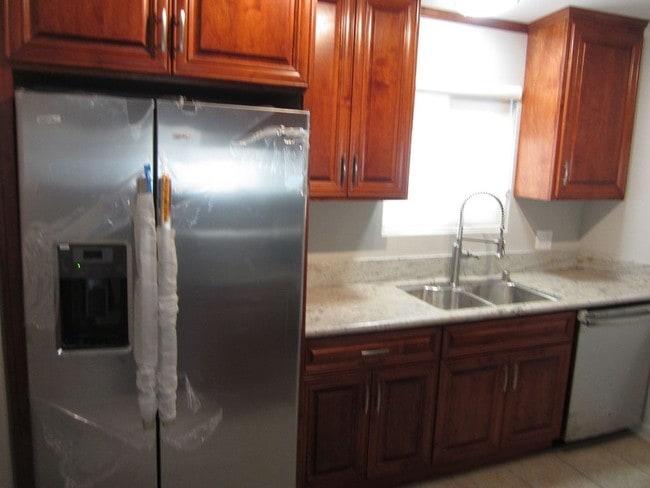 Refrigerator - 306 Larsson St