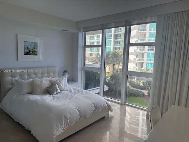 Building Photo - 10275 Collins Ave