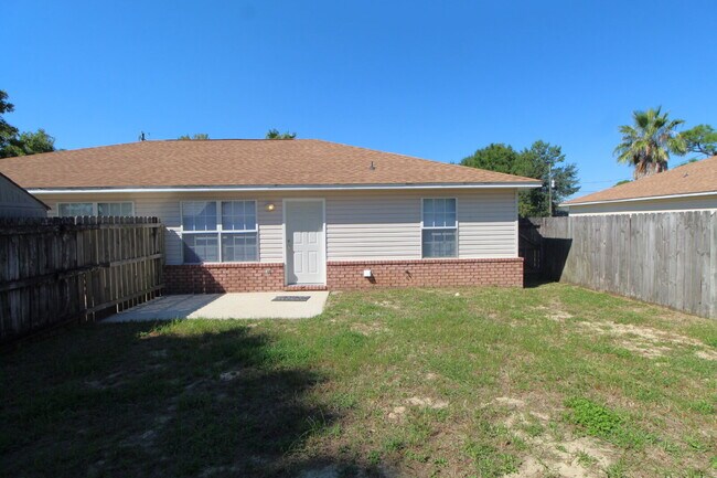 Building Photo - Coastal Living in Gulf Breeze! Spacious 2B...