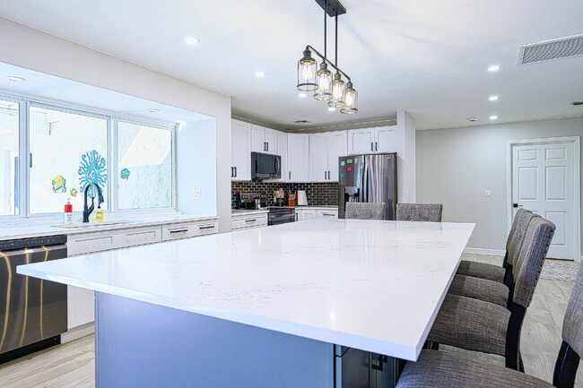 Building Photo - Waterfront Furnished Pool Home with Gulf &...