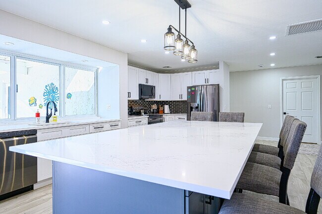 Building Photo - Waterfront Furnished Pool Home with Gulf & Canal Views in Estero Bay Shores