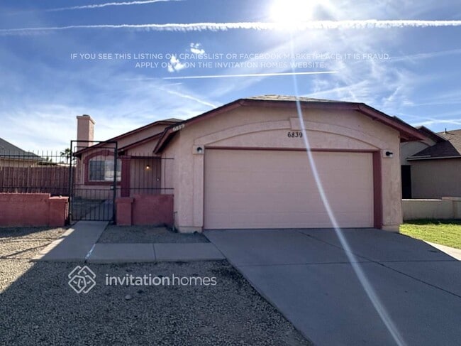 Building Photo - 6839 W Gardenia Ave