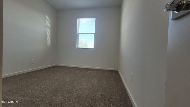 Building Photo - 15998 W Smoketree Dr