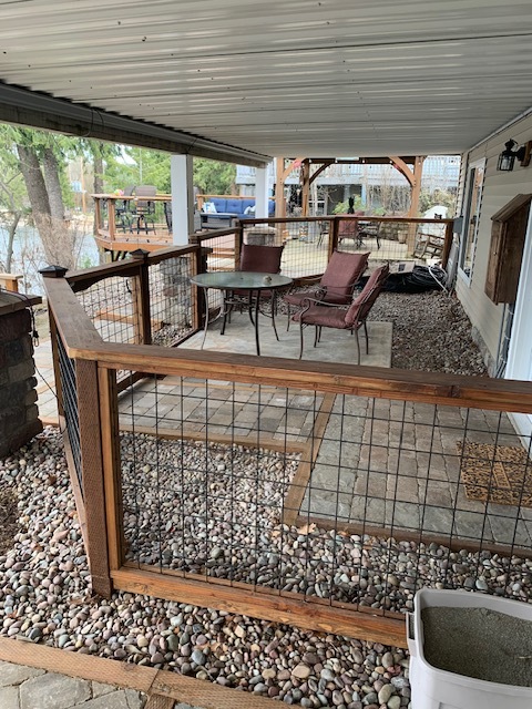 Fenced in Porch with Table and Chairs - 9679 W George Ln