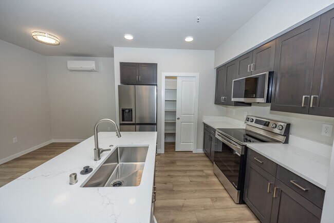 Building Photo - Brand New! - 2 Bedr in Gated Community - Free xfinity Internet