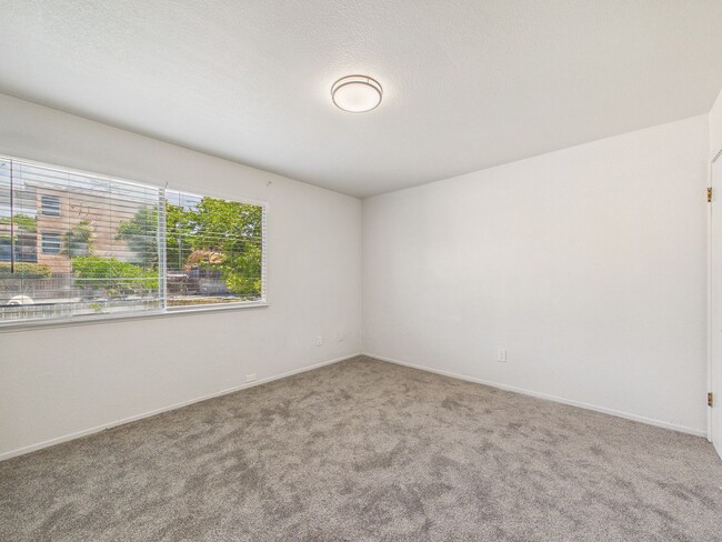 Building Photo - Updated 2 Bed / 1.5 Bath Townhome – In-Unit Washer & Dryer + Garage Parking – $2,700/month