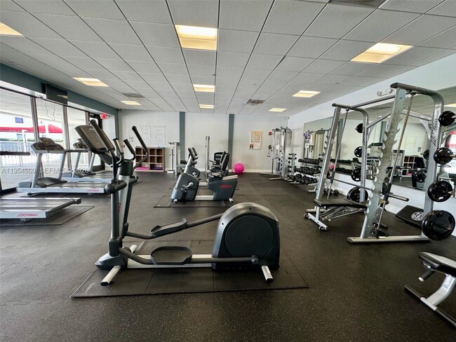 Building Photo - 3675 N Country Club Dr