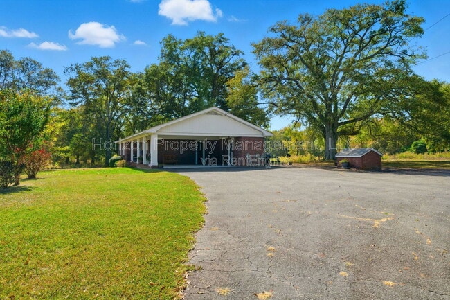 Building Photo - 8730 Jot Em Down Rd