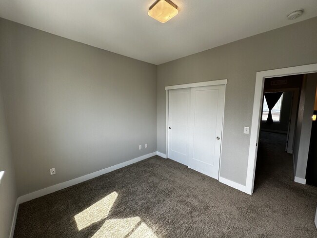 Building Photo - "Experience Modern Comfort: Spacious 2-Bed...