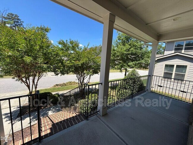 Building Photo - 1009 Magnolia Blossom Ln