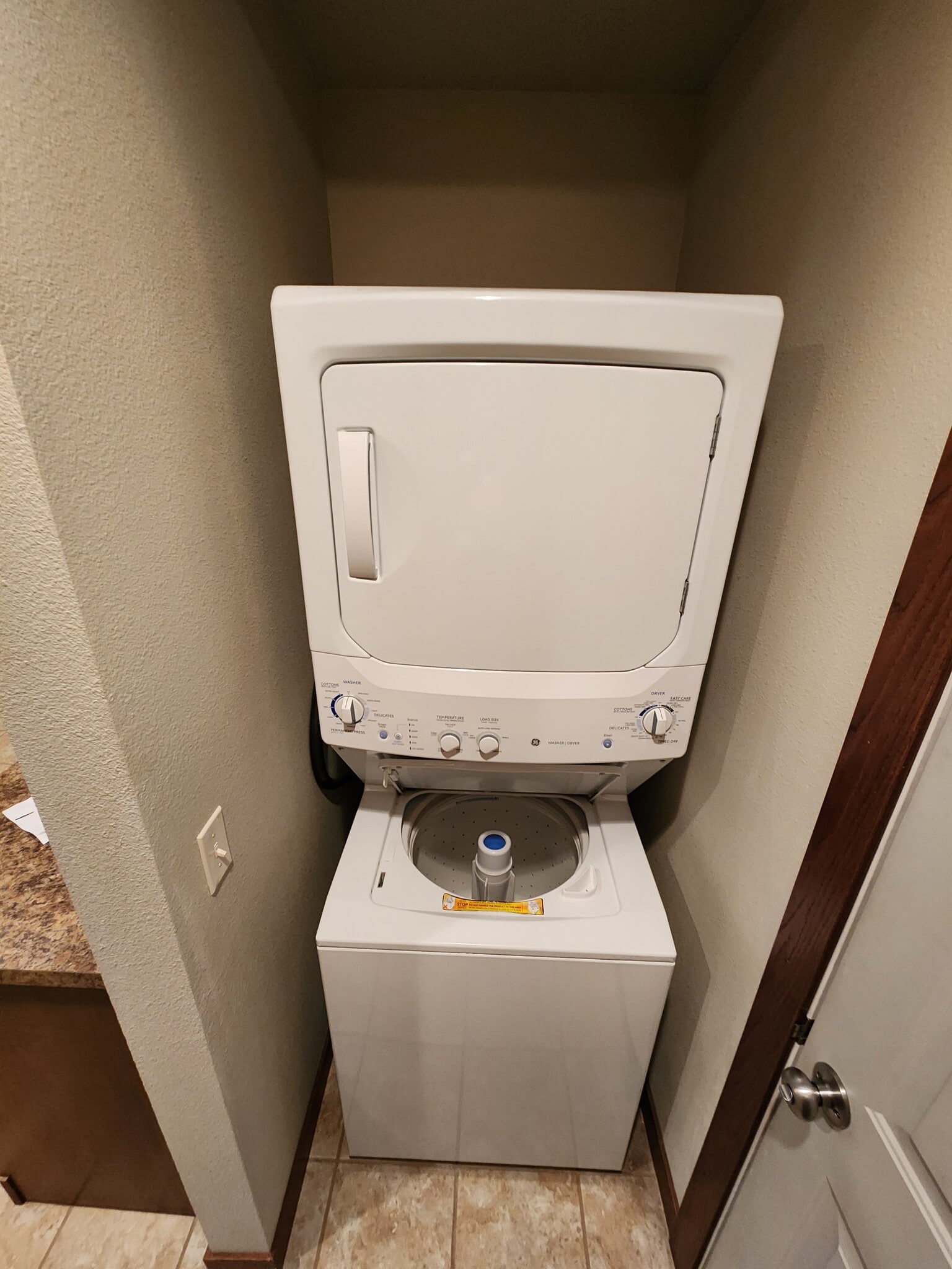 Stacked washer and dryer - 1454 River Edge Rd