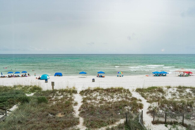 Building Photo - Stunning Beachfront 3-Bedroom Townhome!