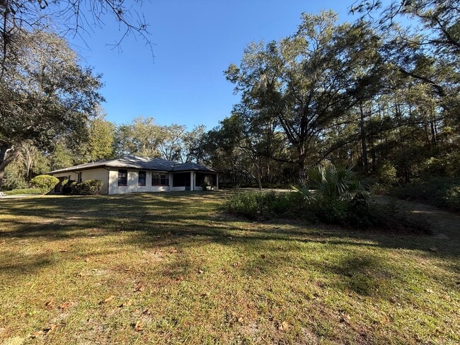 Building Photo - ENJOY EXCLUSIVE RAINBOW RIVER BEACH ACCESS with this beautiful 2BR/2BA Home in Rainbow Springs Co...