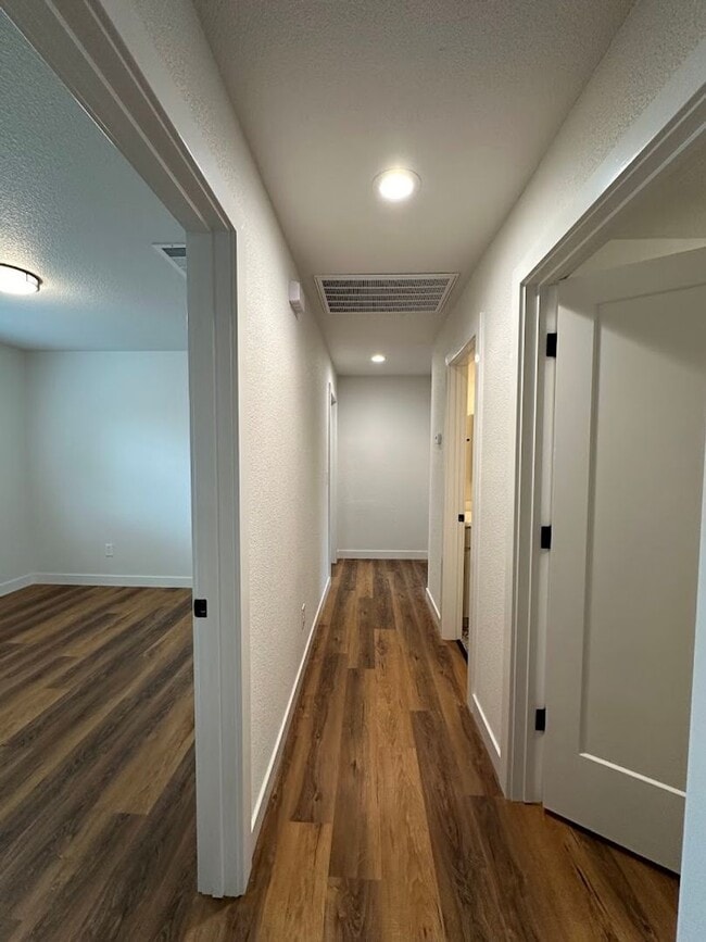 Building Photo - Updated Home with Island Kitchen, LVP Flooring, and Yard Care Included!