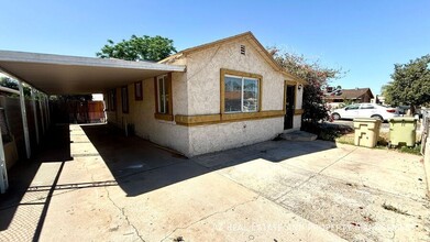 Building Photo - 5547 W Gardenia Ave