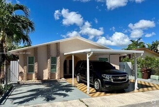 Building Photo - 3840 W 10th Dr