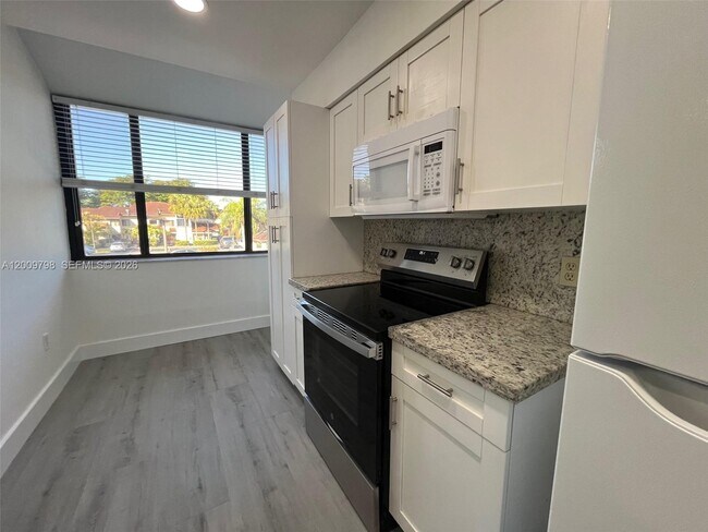 Building Photo - 9795 SW 138th Ave